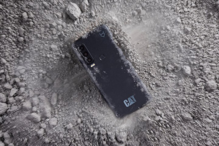 The back of the Cat S75 is covered in dust.