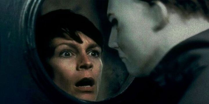 Laurie Strode gets her first glimpse of Michael Myers through a window.