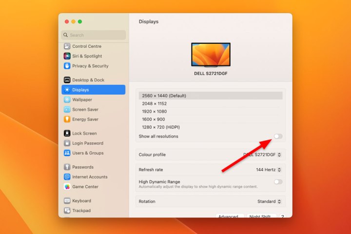 The System Settings app in macOS Ventura on a Mac mini, showing display settings where a user can change their Mac's screen resolution. The "Show all resolutions" toggle is highlighted.