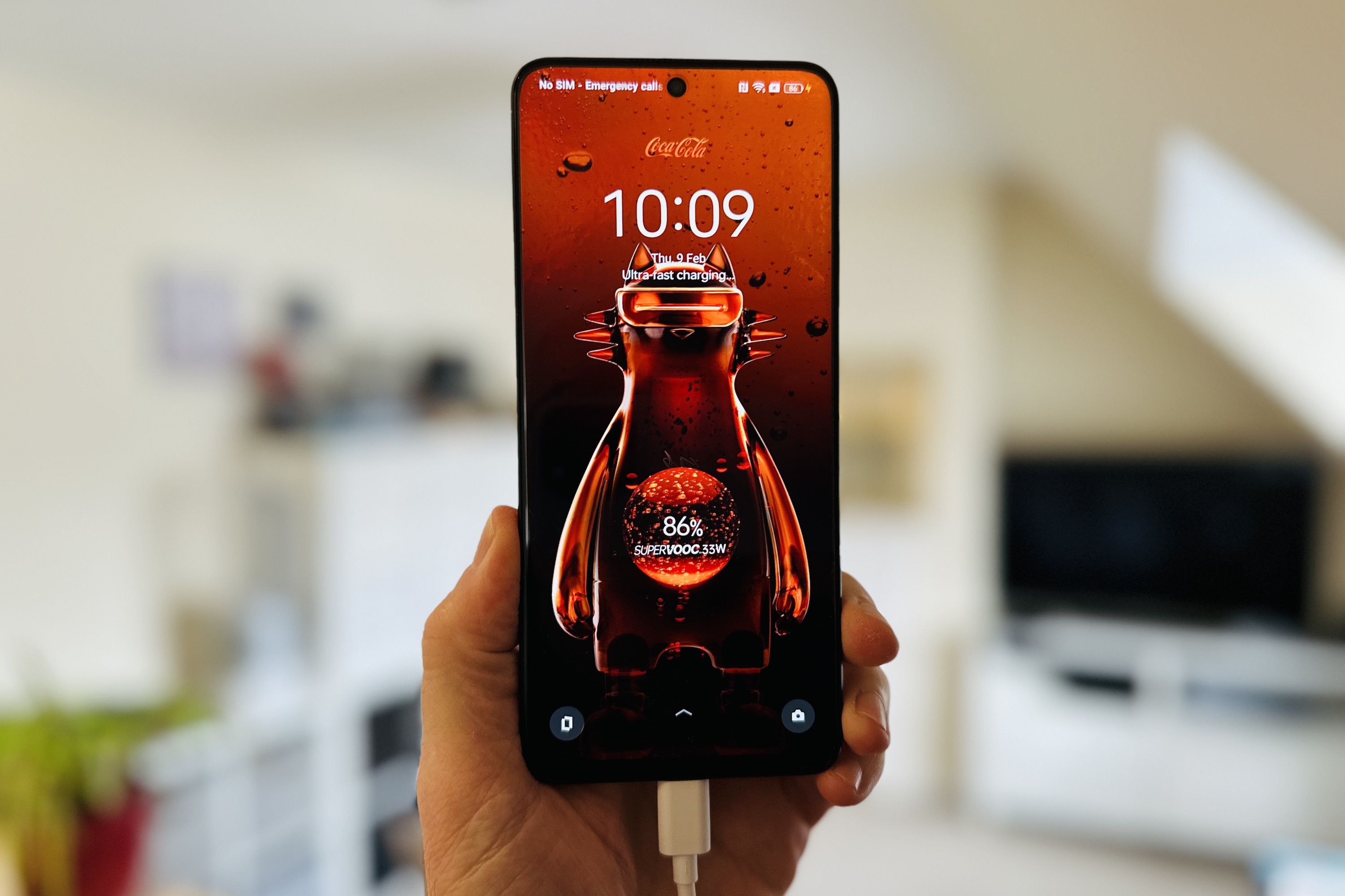 The charging animation on the Realme X Coca-Cola phone.