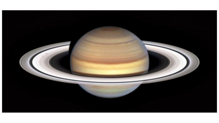 Saturn in its "spoke season" with the appearance of two smudgy spokes in the B ring, on the left in the image.
