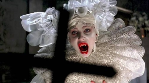 A vampire looks at a cross in Bram Stoker's Dracula.