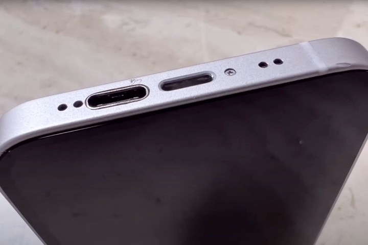 A modified iPhone with a Lightning port and USB-C on the bottom.