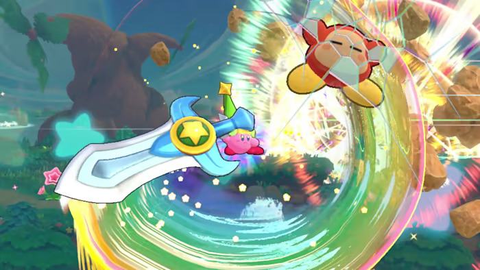 Kirby slashes a Waddle Dee with a massive sword in Kirby's Return to Dream Land Deluxe.