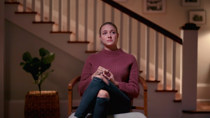 Morgan Sought sitting in a chair near tears talking in the Netflix docuseries Murdaugh Murders.