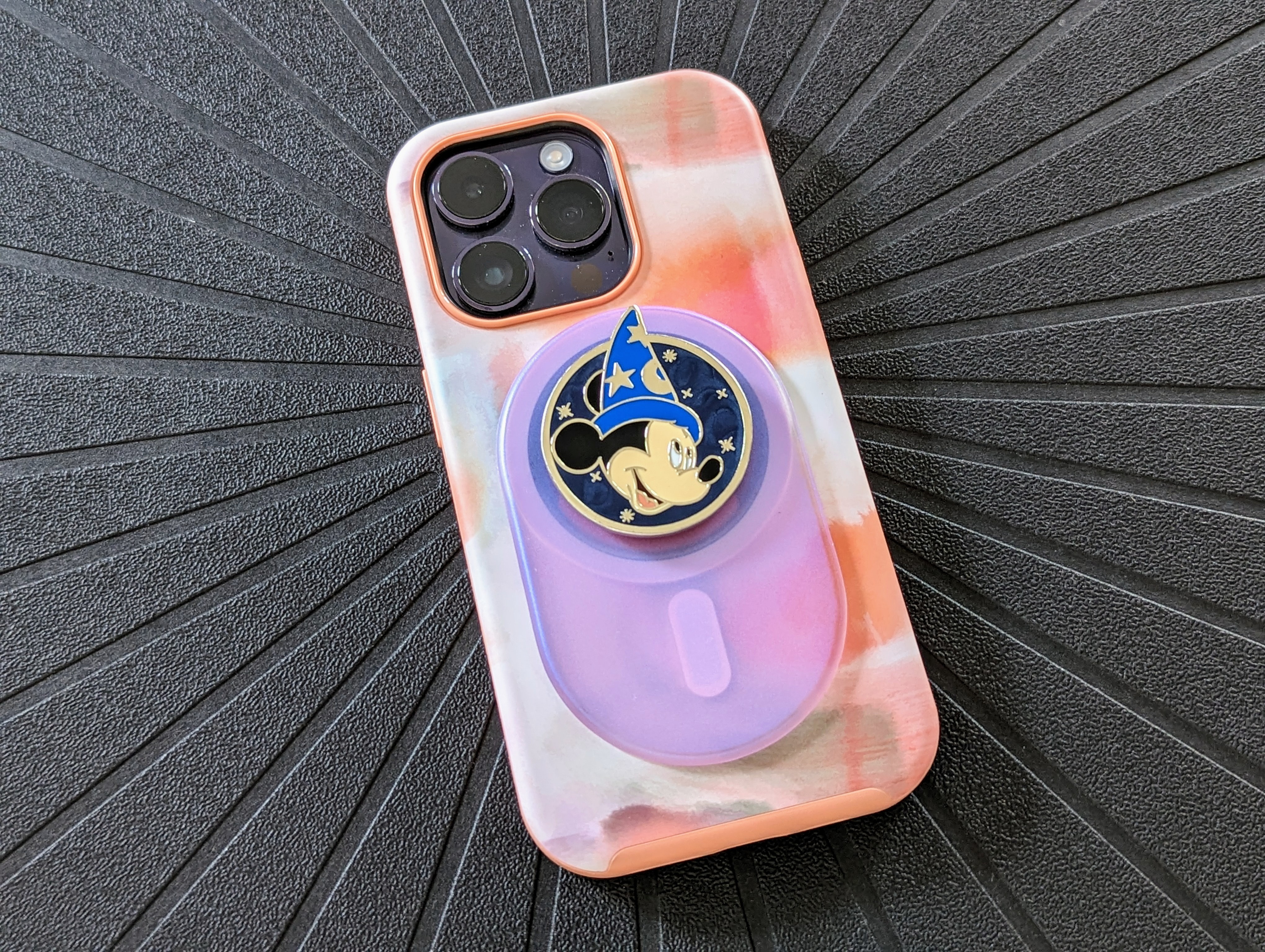 OtterBox OtterGrip case with a PopSockets PopGrip for MagSafe with Sorcerer Mickey