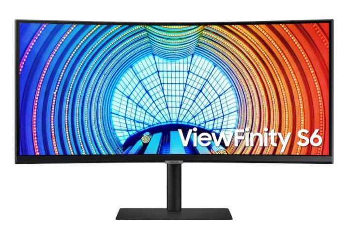 The ultra-wide Samsung gaming monitor displaying a rainbow pattern,
