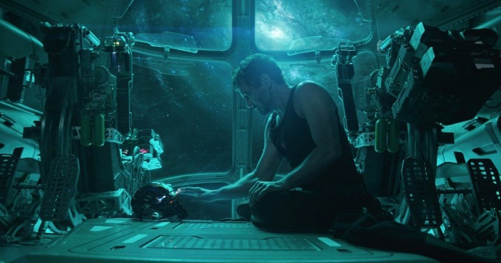 Tony Star looks at his helmet in Avengers: Endgame.