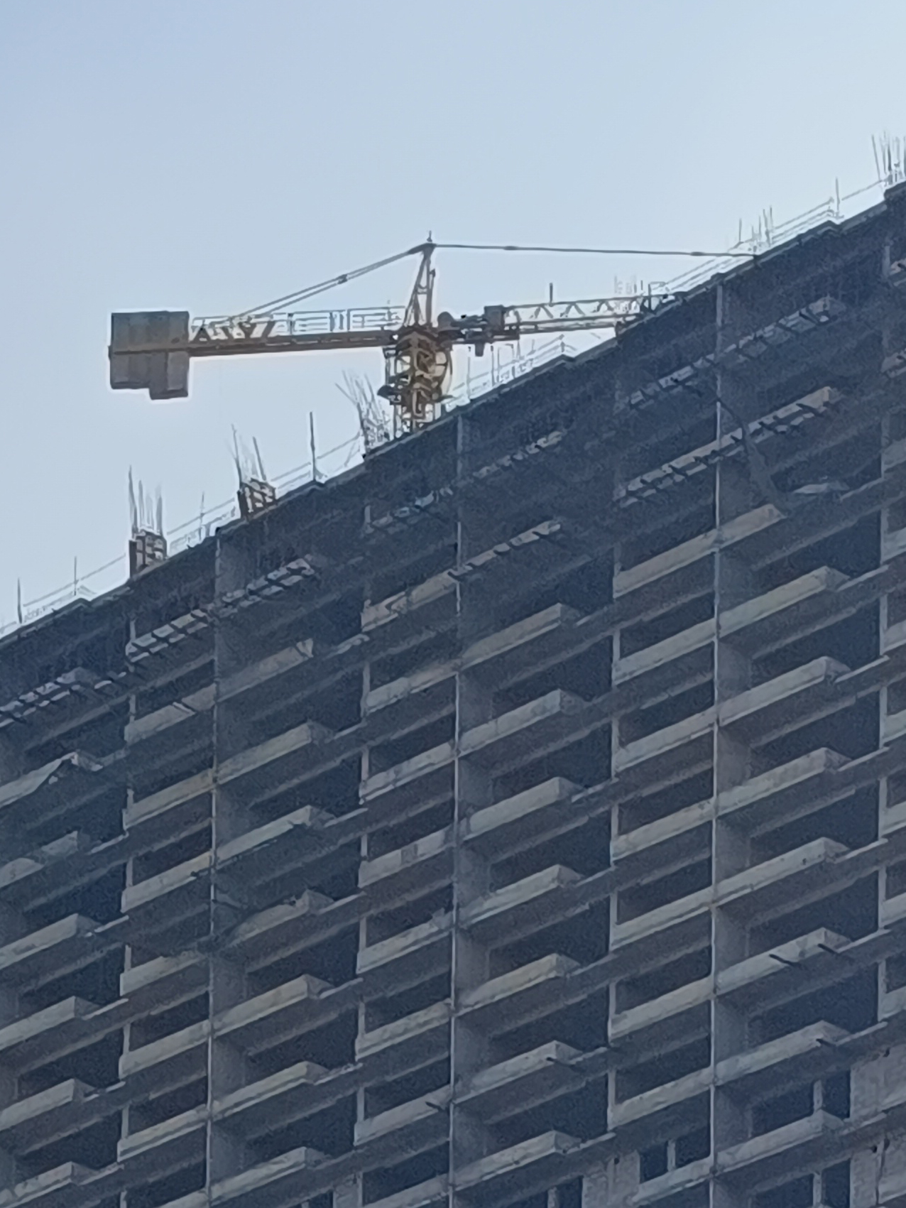 Close up of a Multi-storey building under construction captured by Redmi Note 12 Pro Plus.