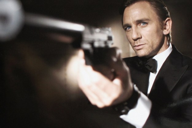 Daniel Craig as James Bond aiming his handgun in Casino Royale.