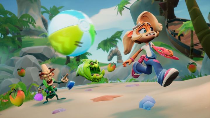 Coco runs from a beachball in Crash Team Rumble.