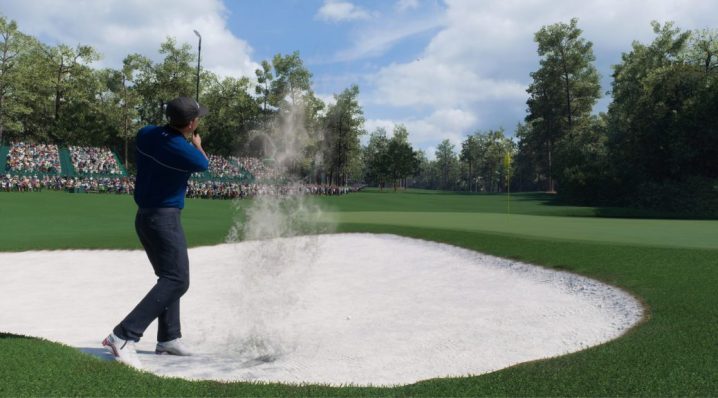 A golfer swings from a sand pit in EA Sports PGA Tour.
