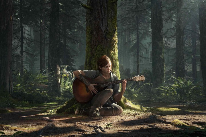 Ellie tient une guitare dans la forêt dans The Last of Us Part 2.