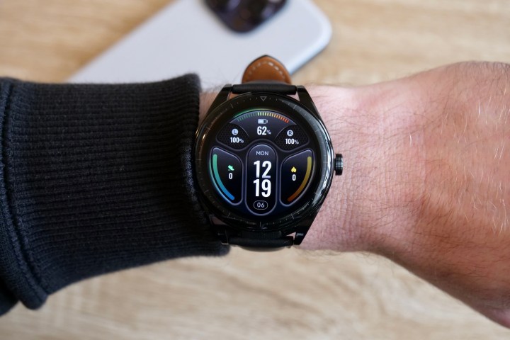 The Huawei Watch Buds on a person's wrist.