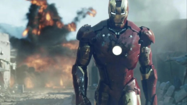 Iron Man walking away from an explosion in the 2008 movie.