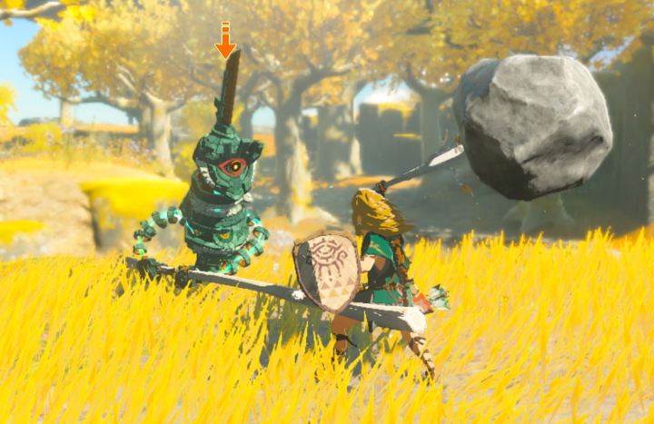 Link fights a Construct with a fused weapon in The Legend of Zelda: Tears of the Kingdom.