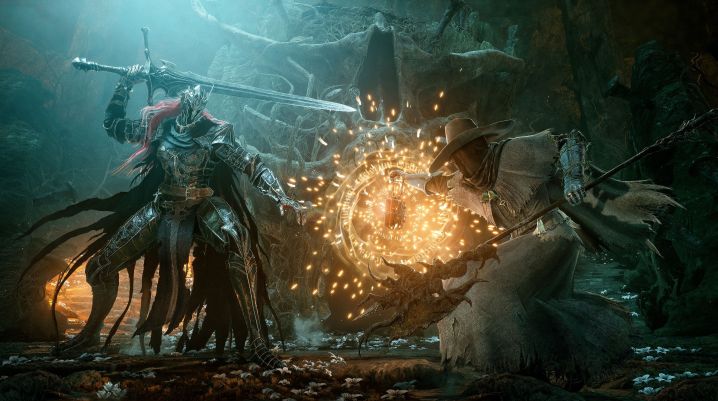 A cleric fights a boss in Lords of the Fallen.