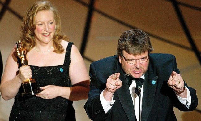 Michael Moore on stage at the Oscars.