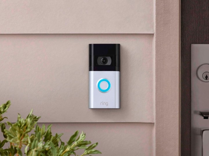 A Ring Video Doorbell 4 mounted come a rental's front door.