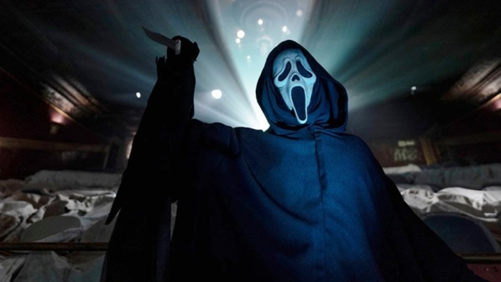 Ghostface raises his knife in Scream 6.