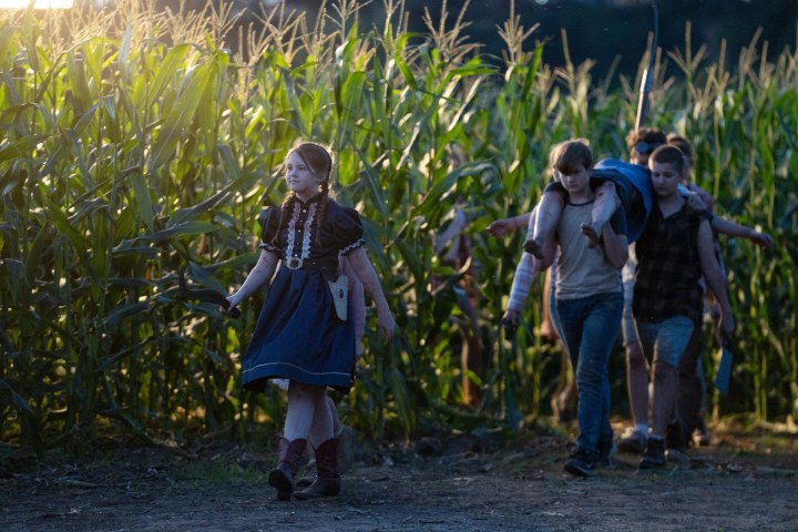Kids walk in a cornfield in Children of the Corn.