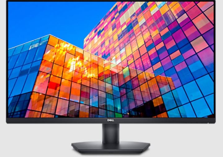Monitor Dell de 32 polegadas exibindo um edifício colorido.