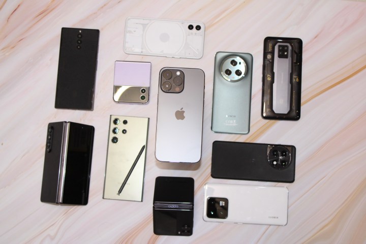 iPhone 14 Pro Max surrounded by flagship phones.