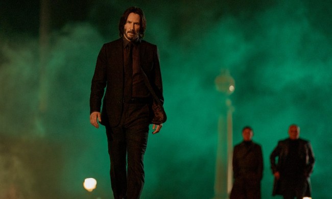 Keanu Reeves walks toward the camera in John Wick: Chapter 4.