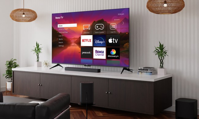 Roku Plus Series television in a living room setting.