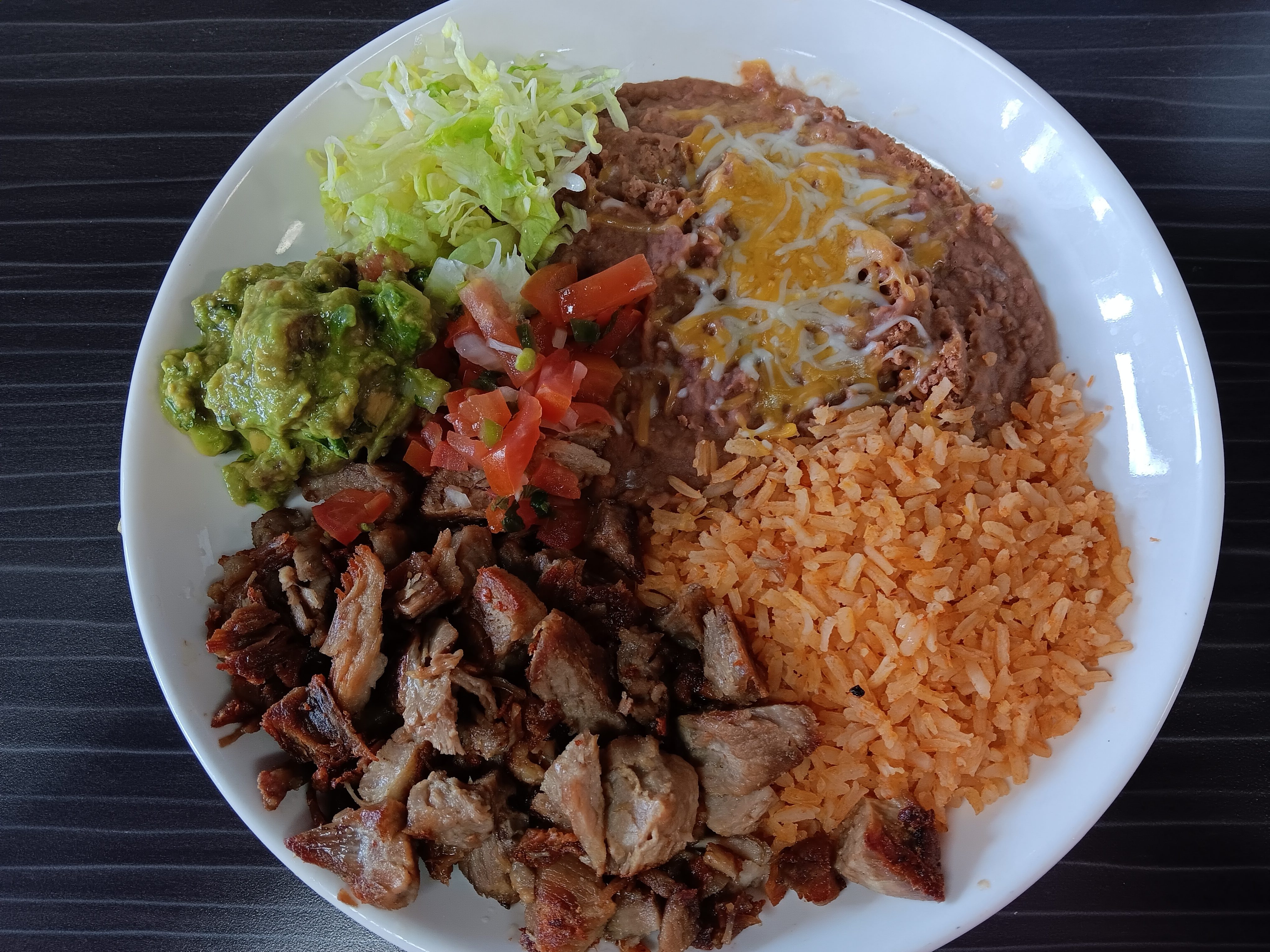 A plate of carnitas shot with Samsung Galaxy A14 5G