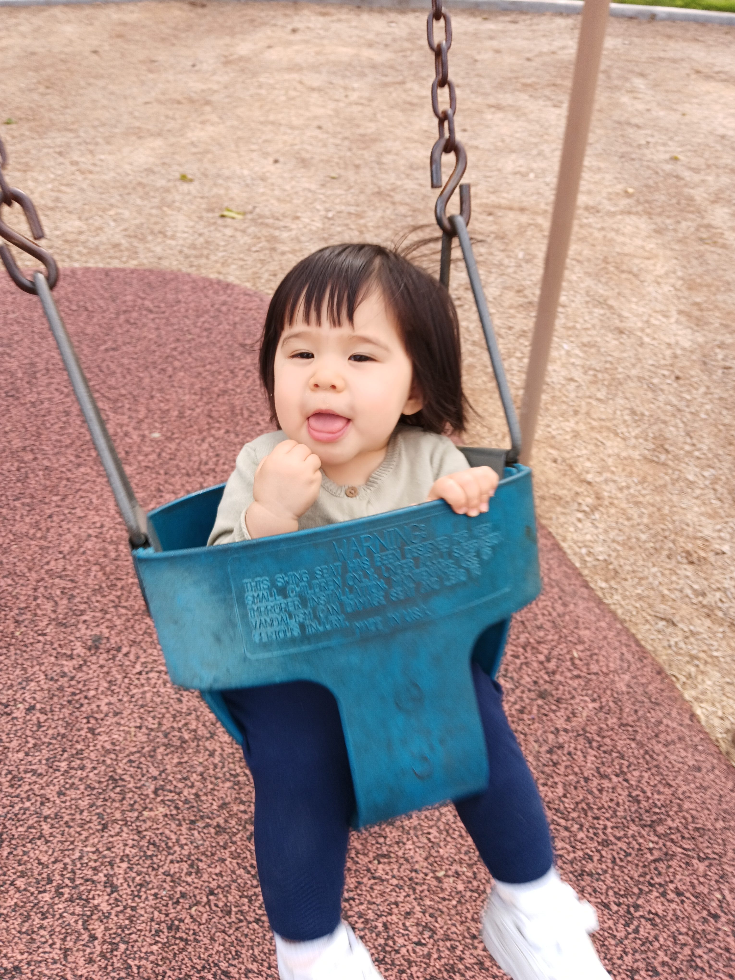 Toddler in swing taken by Samsung Galaxy A14 5G
