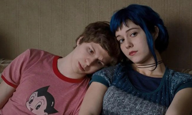 Scott with his head on the shoulder of his girlfriend Ramona in a scene from Scott Pilgrim vs. the World.