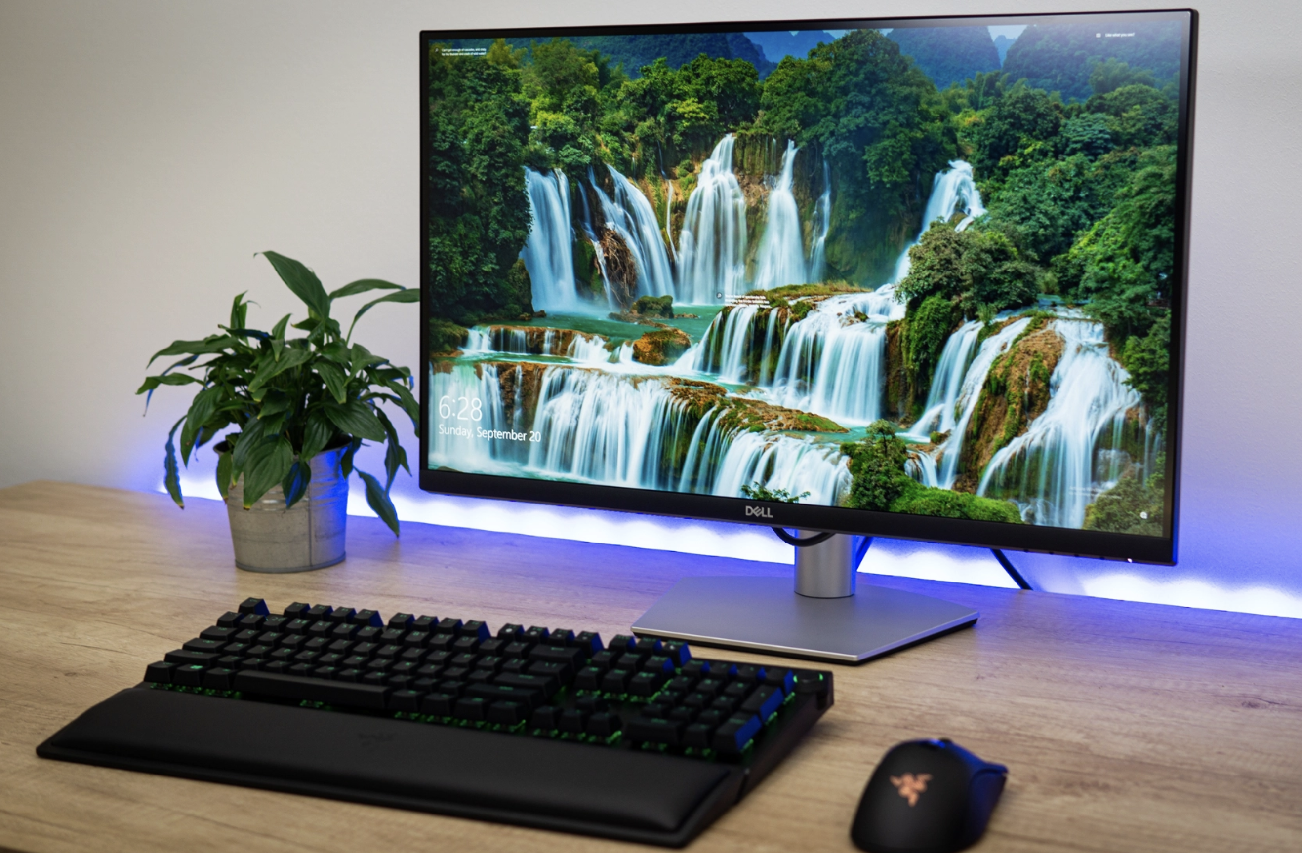 The 27-inch Dell S2721QS 4K monitor on a table.