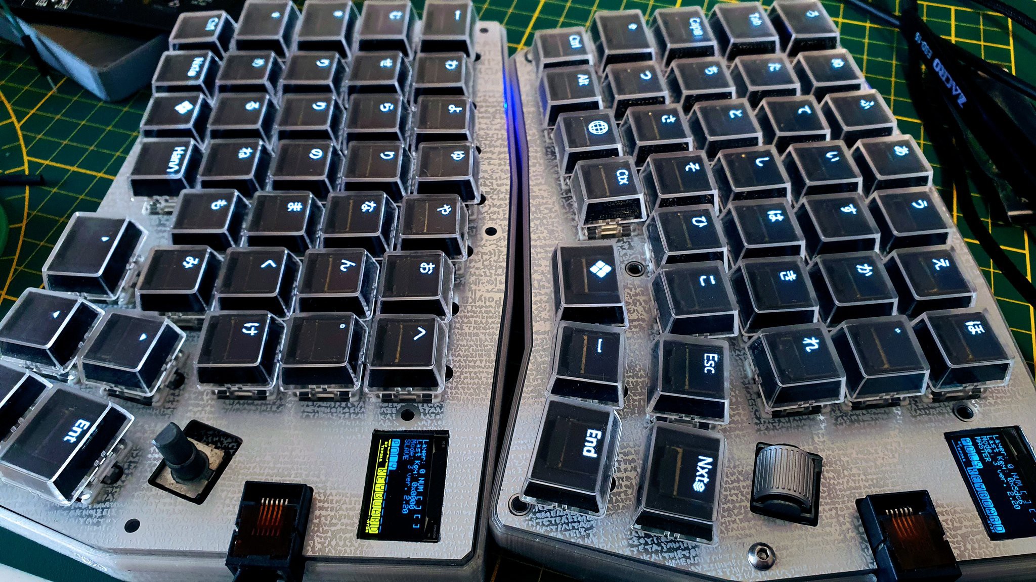 PolyKybd, a split keyboard with OLED screens in the keycaps.