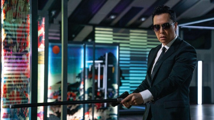 Caine (Donnie Yen) investigating in John Wick: Chapter 4