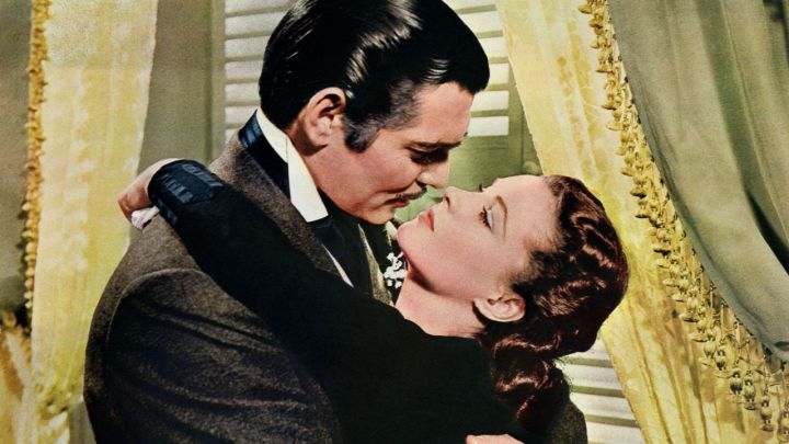 Rett Buttler and Scarlett O'Hara embracing in Gone with the Wind.