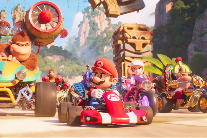 Donkey Kong drives behind Mario in The Super Mario Bros. Movie.