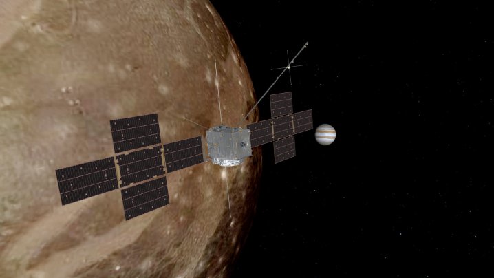 JUICE 宇宙飞船探索木星及其巨型卫星 Ganymede 的艺术家印象图。