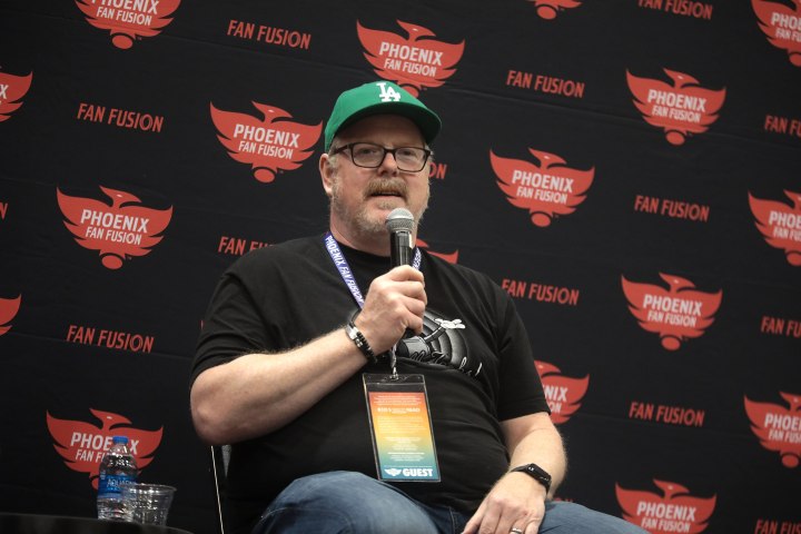   John DiMaggio speaking with attendees at the 2022 Phoenix Fan Fusion at the Phoenix Convention Center in Phoenix, Arizona.