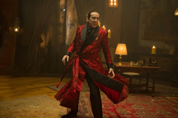 Nicolas Cage spins around in a red robe in Renfield.