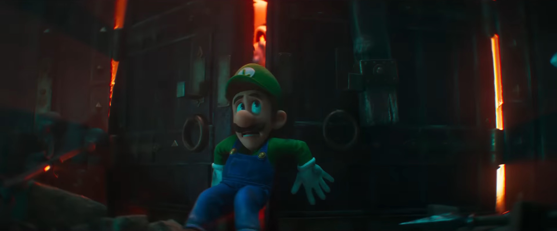 Luigi contra uma porta enquanto Dry Bones tenta capturá-lo em "The Super Mario Bros. Movie".