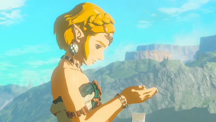 Zelda sostiene un objeto en forma de lágrima en su mano en el tráiler final de The Legend of Zelda: Tears of the Kingdom.