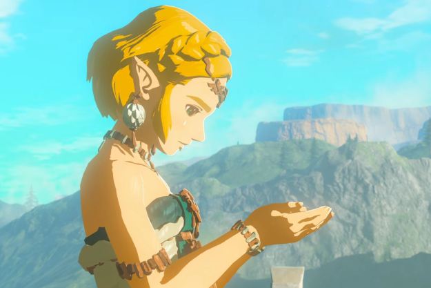 tech news Zelda holds a tear-shaped object in her hand in The Legend of Zelda: Tears of the Kingdom's final trailer.