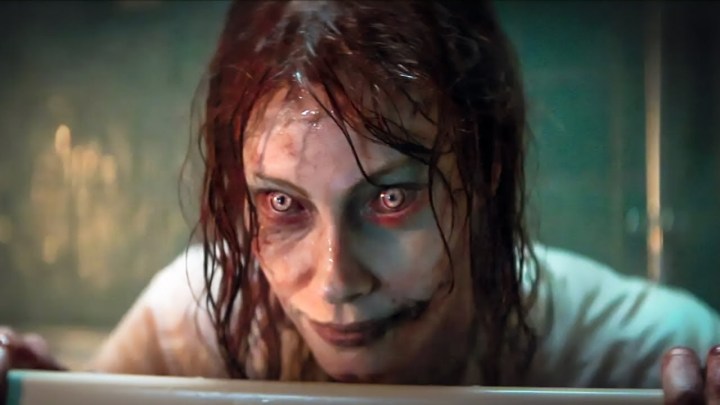A zombie mother looks forward in Evil Dead Rise.