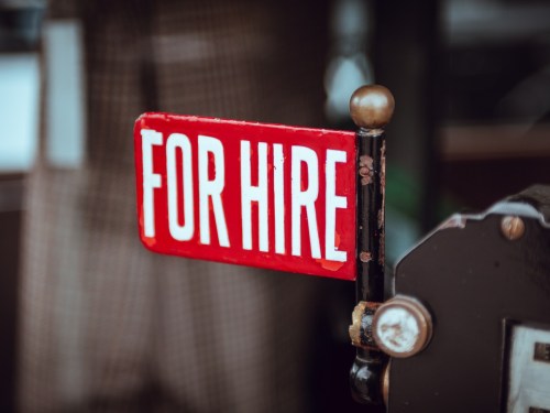 For hire sign used by small businesses on hiring platforms to find top-tier talent.