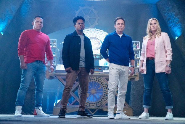 Four adults stand together in Mighty Morphin Power Rangers: Once and Always.