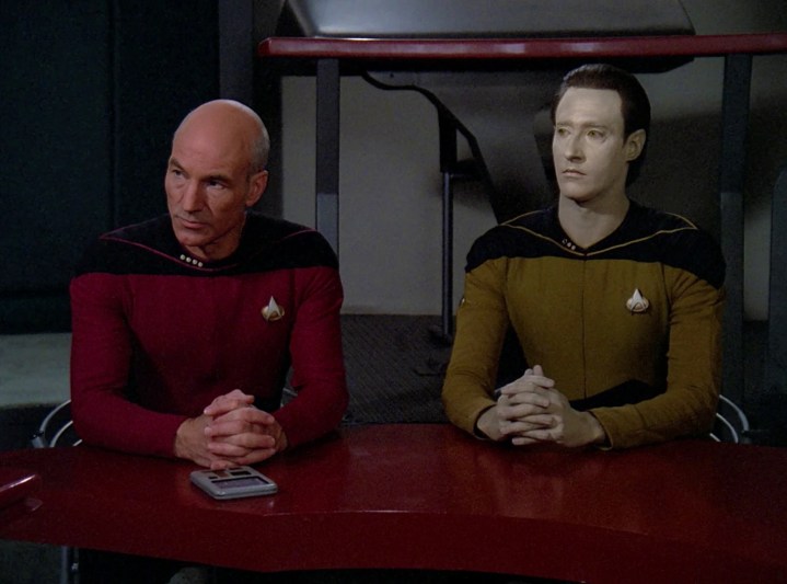 Picard and Data sit at a table in Star Trek: The Next Generation.