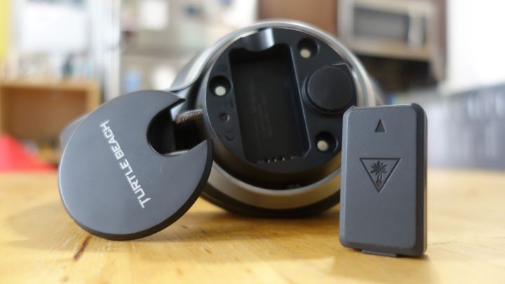 A Turtle Beach Stealth Pro and its battery are on a table.