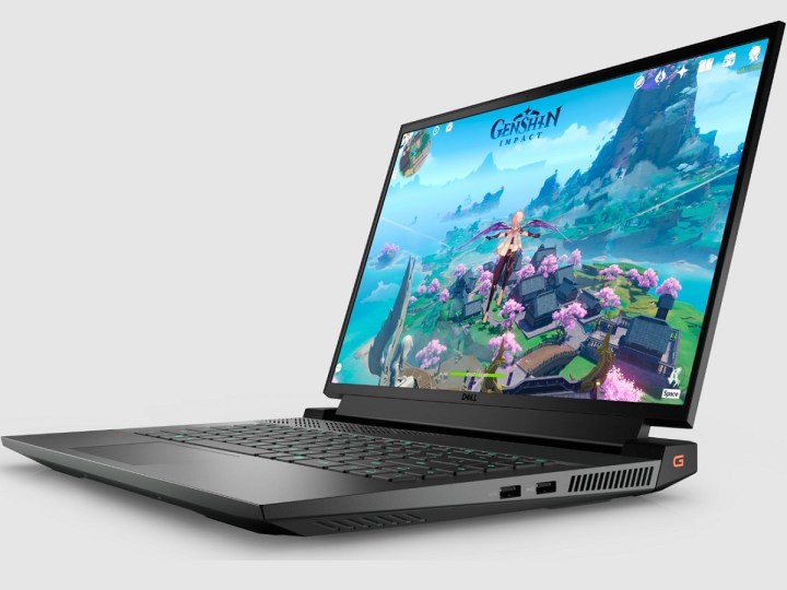 Dell G16 gaming laptop with Genshin Impact on screen.