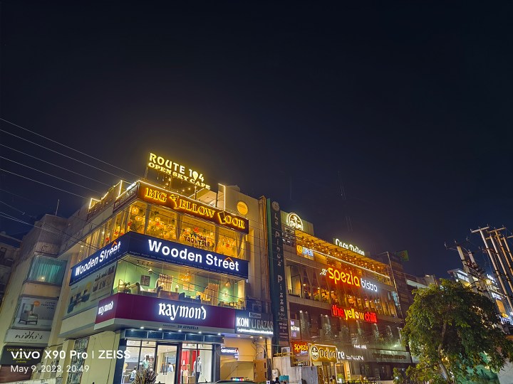Restaurant signages and hoardings captured by Vivo X90 Pro with night mode.